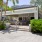 Outdoor pavilion with kitchen and lounge seating