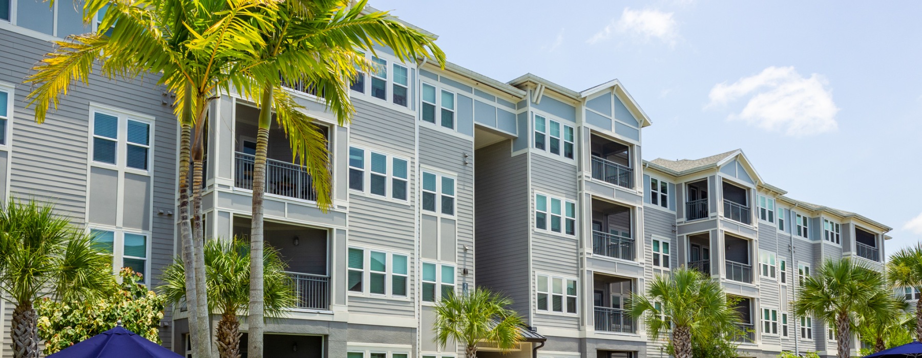 resort style pol next to building