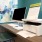 Computer and printer on table