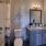 a bathroom with a tub sink and toilet