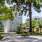 a building with trees and grass